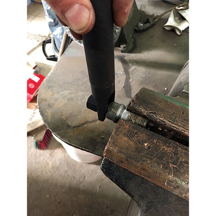 the user has the components of wheel nut removal tool in a vice